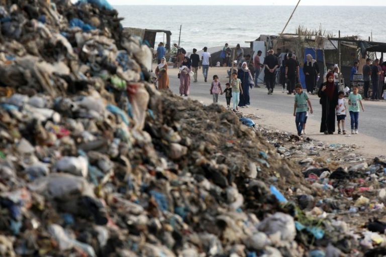 Flies, mosquitoes, raw sewage and mountains of garbage threaten to worsen Gaza’s health crisis