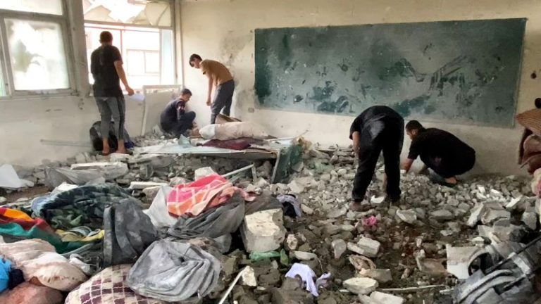Israeli airstrike kills dozens sheltering in UN school, Gaza officials say