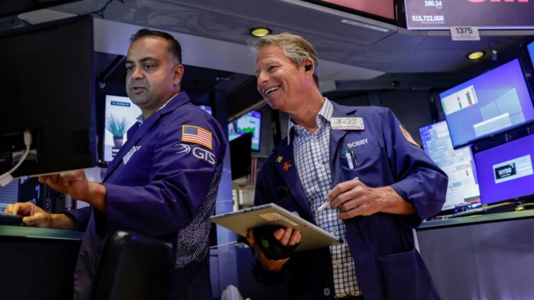 Nasdaq rises to new record; S&P 500 closes flat as oil slides for a fifth day